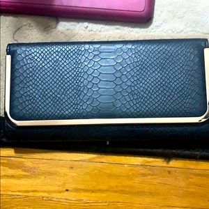 Aldo clutch black and gold
